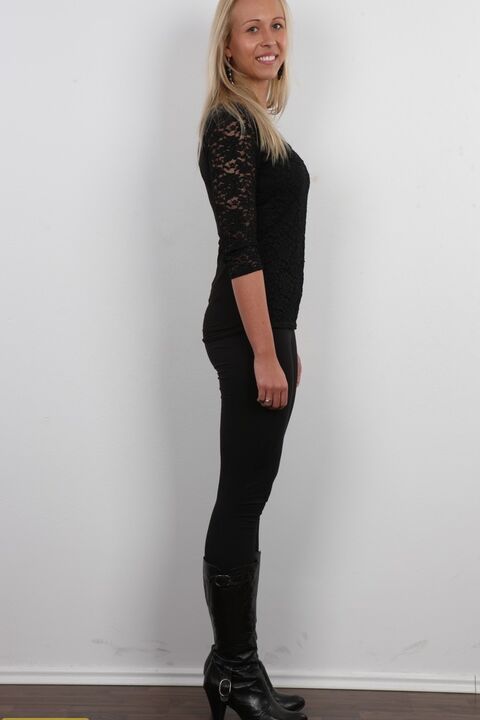 20P Tall blonde Dominika sports a nice smile while taking off all her clothes