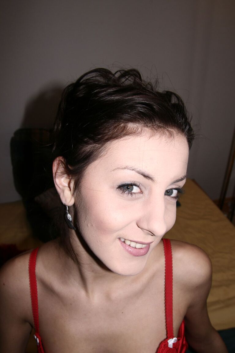 21P Brunette girl with blue eyes Nicky shows her titties and rides a dong