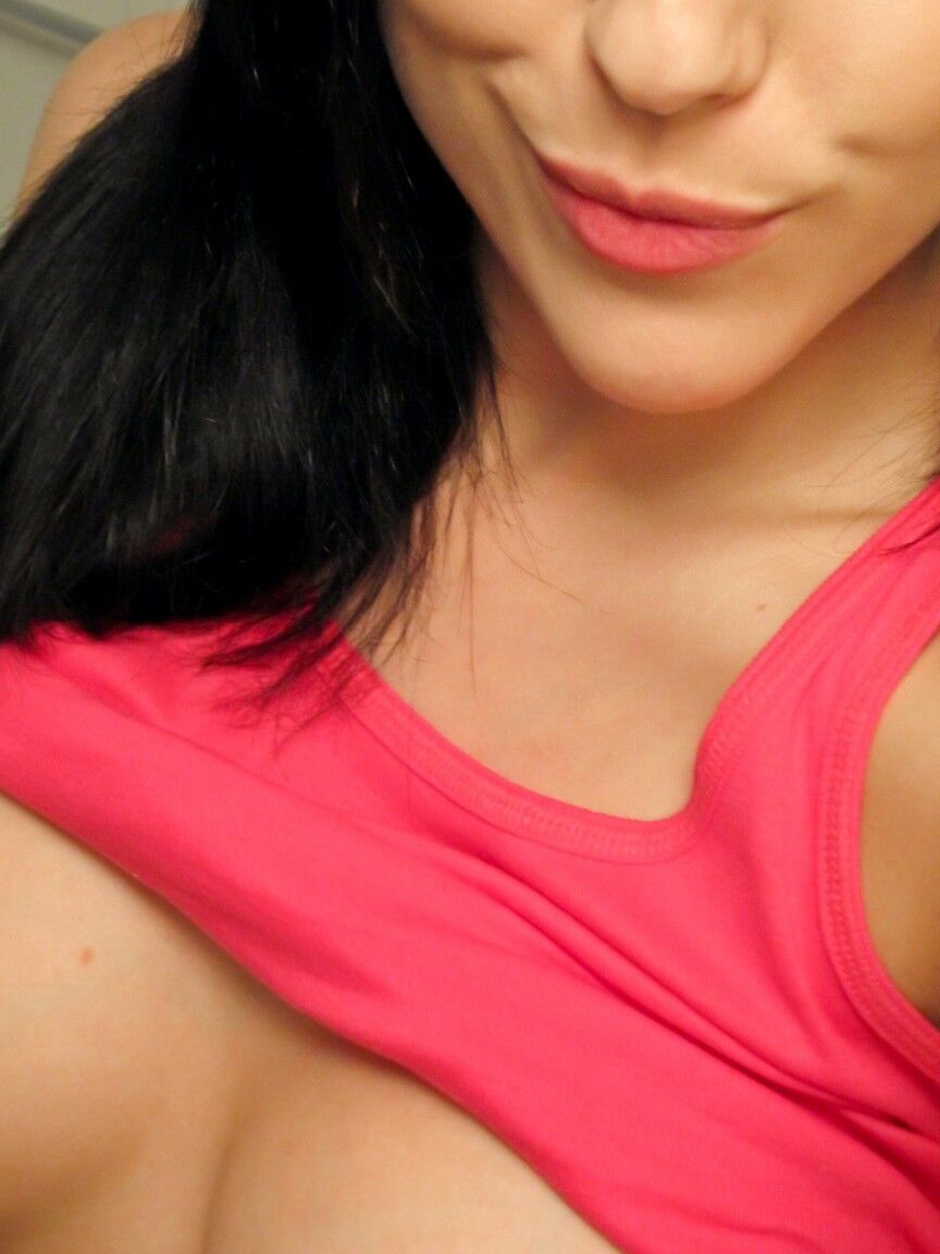 15P Busty amateur Katie Banks licks a nipple while taking mirror selfies