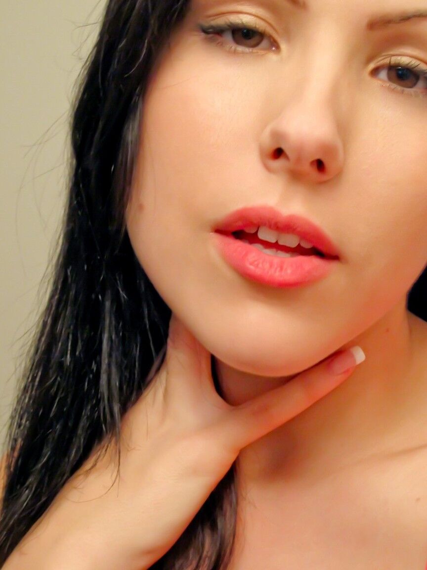 15P Busty amateur Katie Banks licks a nipple while taking mirror selfies