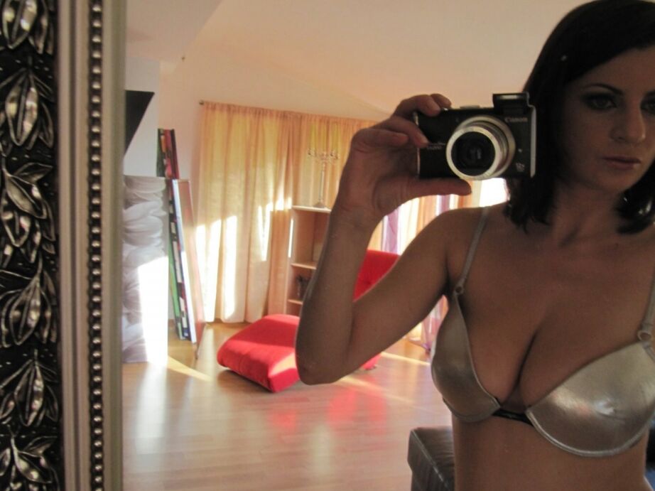 16P Stunning brunette babe with petite jugs stripping and spreading her legs