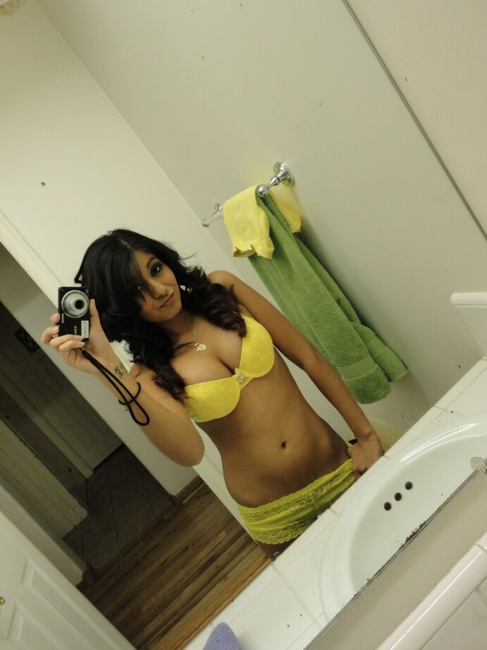 16P Brunette girlfriend type Ruby Reyes takes self shots on exposed boob in mirror
