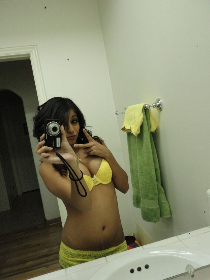 16P Brunette girlfriend type Ruby Reyes takes self shots on exposed boob in mirror