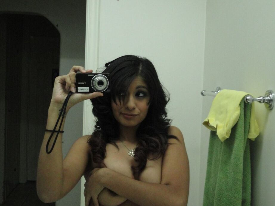16P Brunette girlfriend type Ruby Reyes takes self shots on exposed boob in mirror