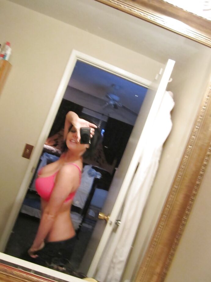 16P Hot ex-gf Loni Evans taking selfshots of her perfect tits in bathroom mirror