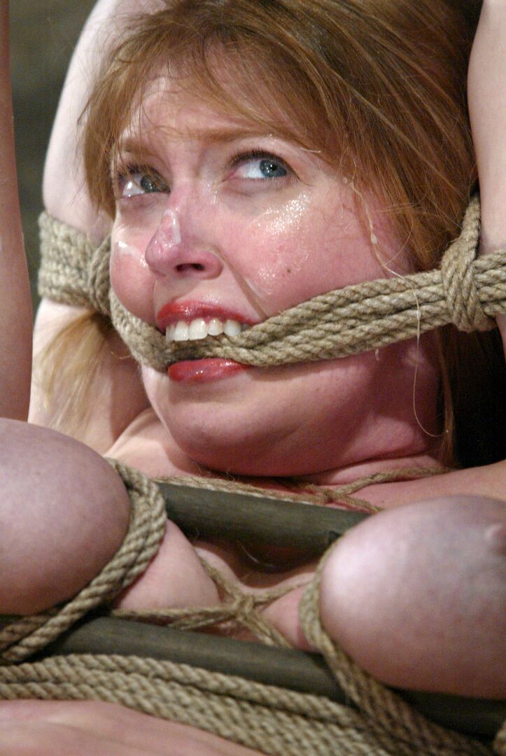 21P Tied up MILF Dee Williams has a huge dildo shoved into her vulnerable pussy