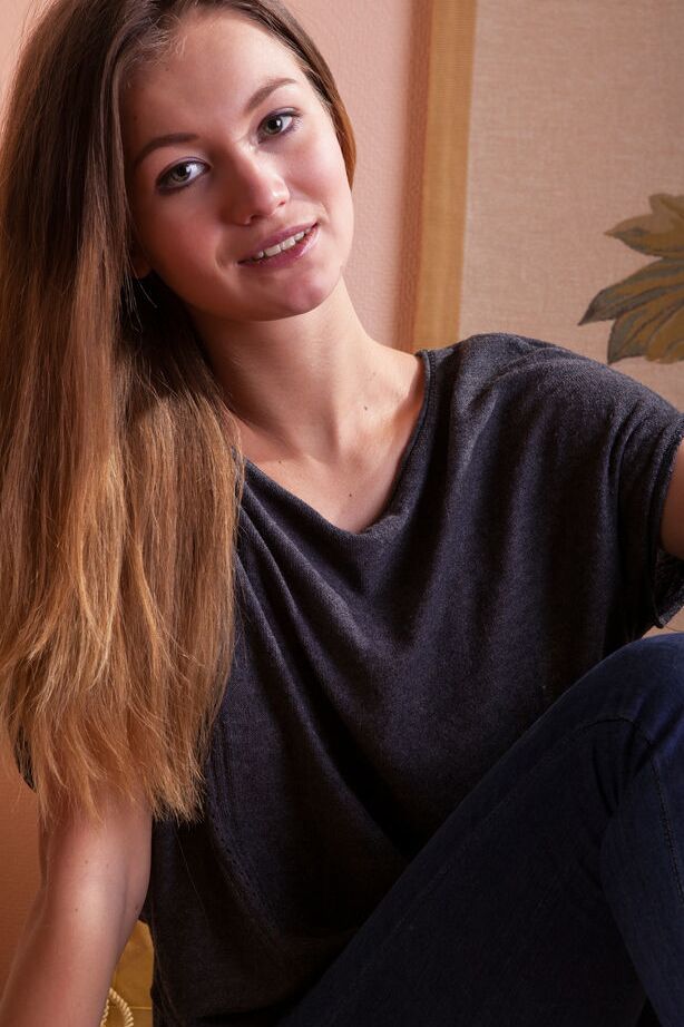 18P Fully clothed model Solveig shedding denim jeans to pose in the nude