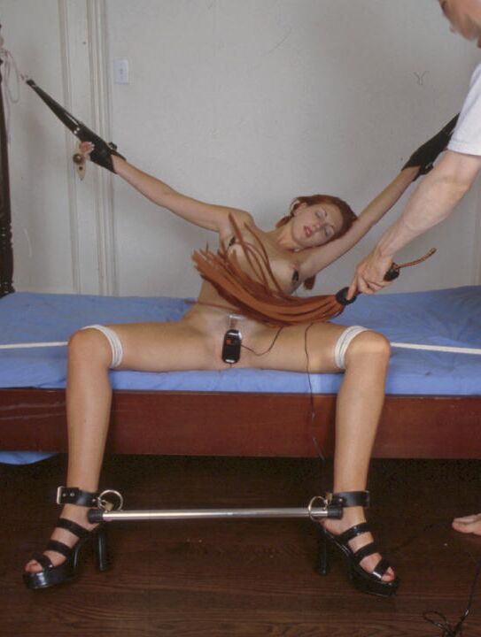 21P Handcuffed redheaded doll Ivy getting humiliated & whipped by her master
