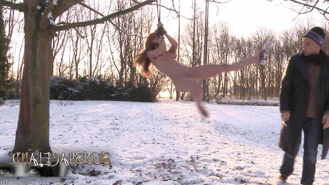 17P Collar bound white girl Olga Barz is whipped raw in the nude on snowy ground