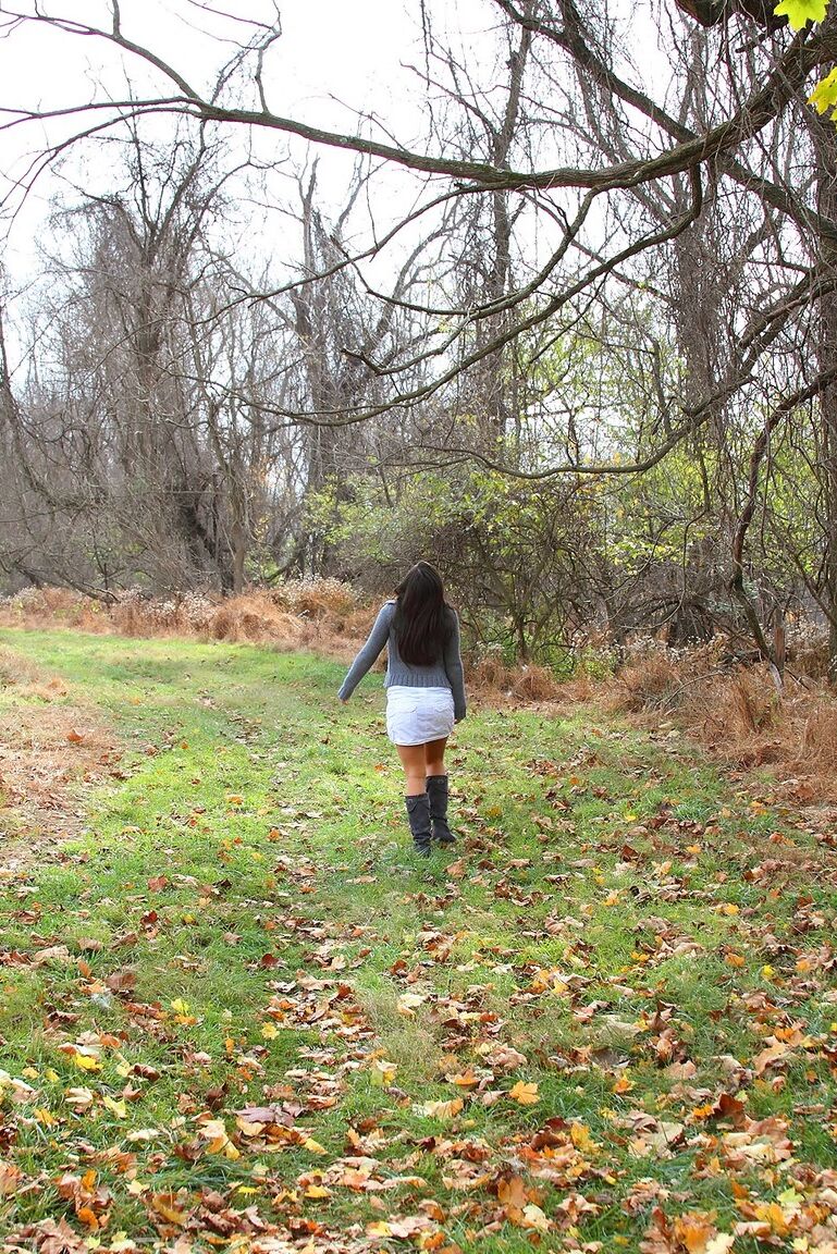 16P Amateur model strips to her underwear while climbing a scrubby tree
