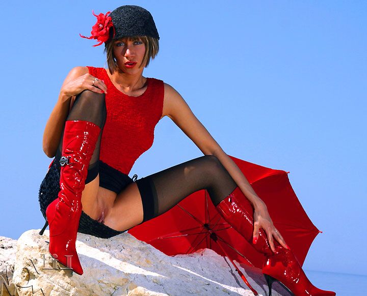 12P Fiery MILF Lily in black stockings and red boots