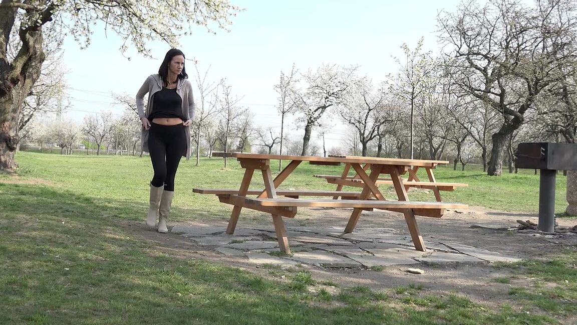 15P Eveline Neill squats and pees on picnic bench