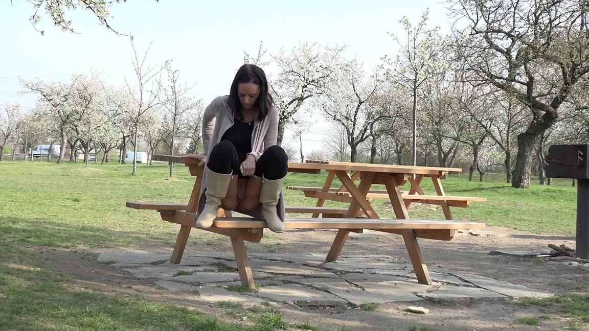 15P Eveline Neill squats and pees on picnic bench