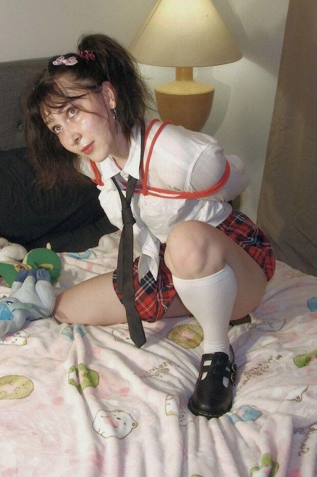 16P Young student exposes her thong while ball gagged and tied up in her uniform
