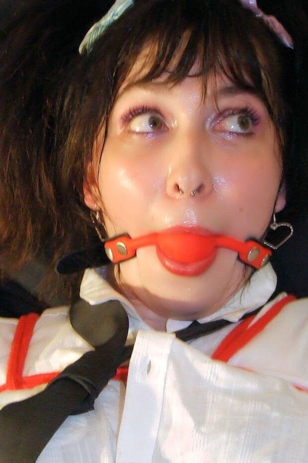 16P Young student exposes her thong while ball gagged and tied up in her uniform