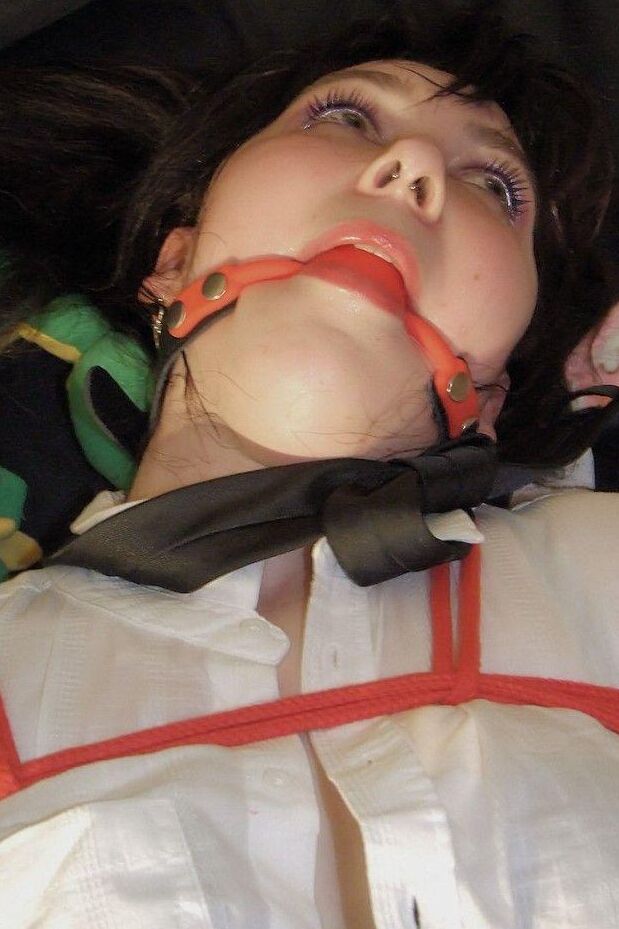 16P Young student exposes her thong while ball gagged and tied up in her uniform