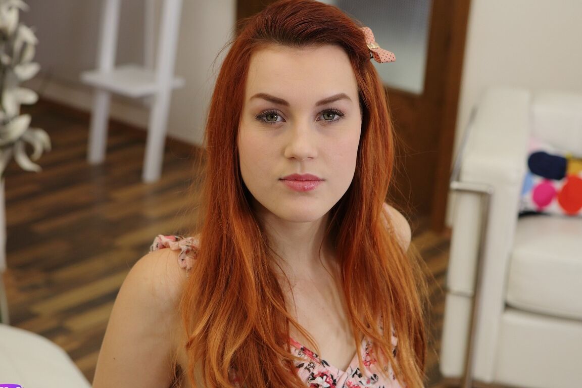 21P Redheaded Charli Red reveals her small tits and rubs her twat on the floor