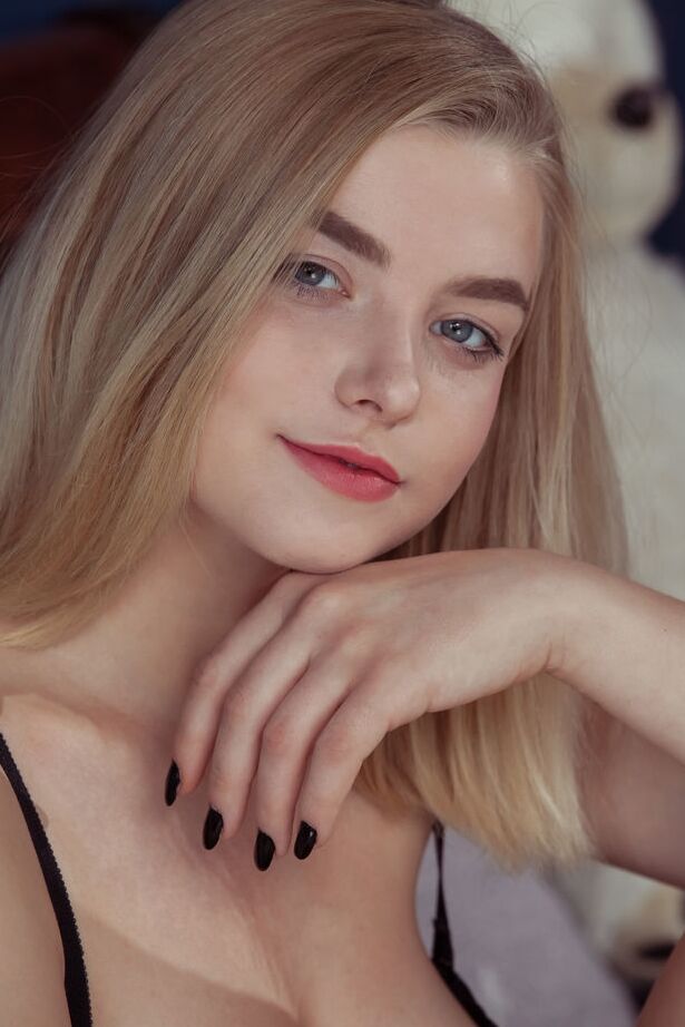 18P Daniel Sea sizzles her way through a hot lingerie strip for her cam viewers