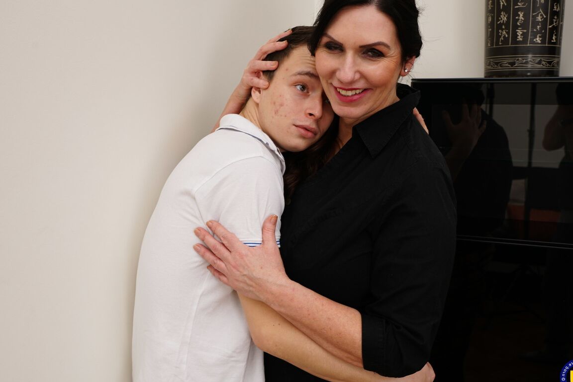16P Older lady with massive breasts seduces a young boy to be her play thing