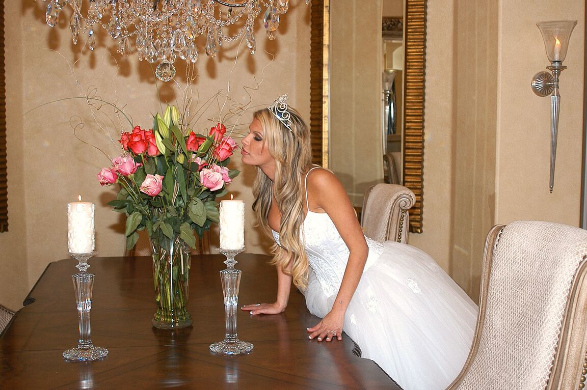 17P Gorgeous bride Kendall Brooks teases with plentiful cleavage in wedding gown