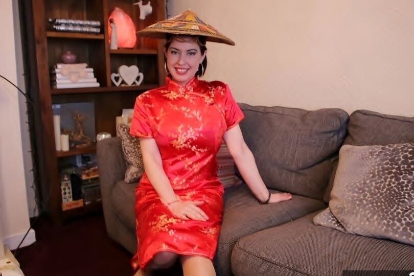 20P British MILF Juicey Janey slips off a Japanese themed dress in a matching hat