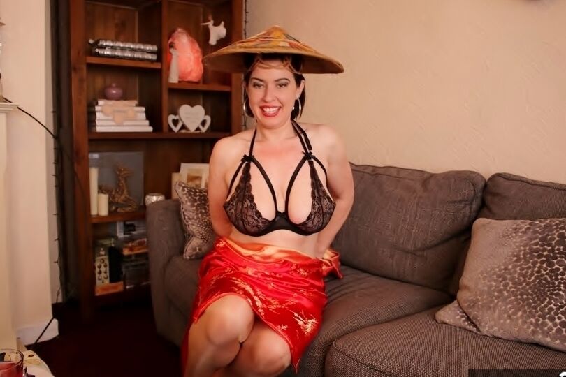 20P British MILF Juicey Janey slips off a Japanese themed dress in a matching hat