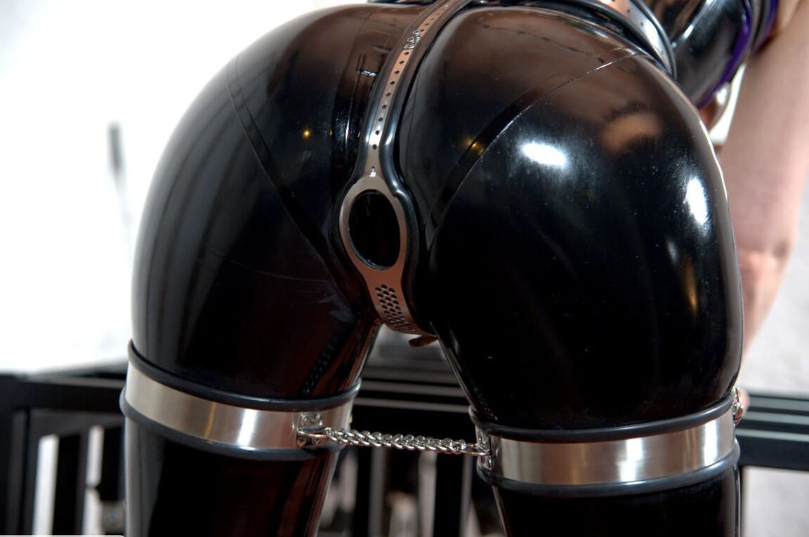 16P Latex adorned lesbians walk around bondage room in stiletto heels