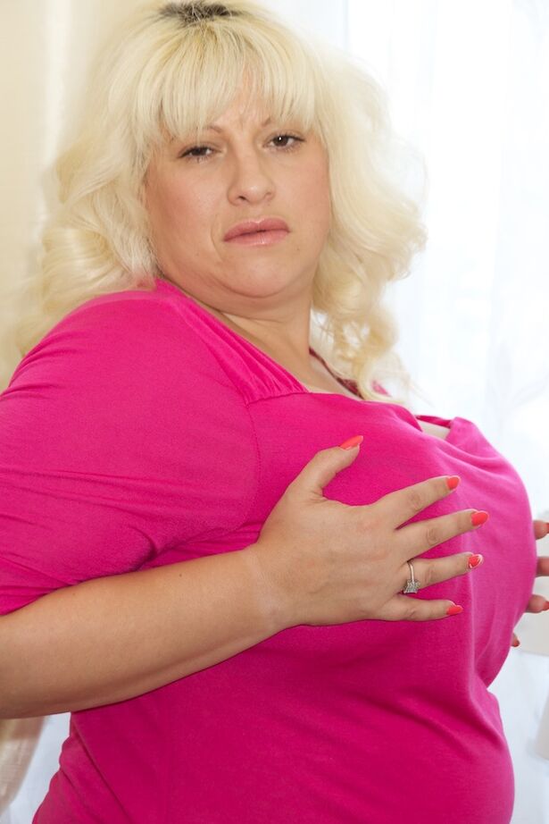 20P Overweight UK blonde Gina George uncovers knockers before sliding undies aside