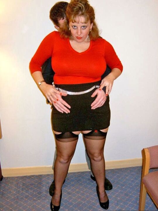 20P British redhead Curvy Claire has her large boobs suckled on by a clothed man
