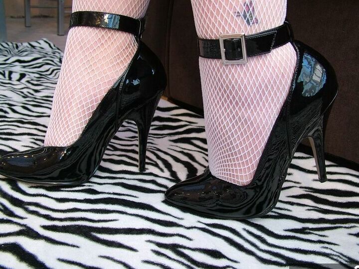 20P Fat older lady Double Dee hikes a latex mini to show her twat in a mesh attire