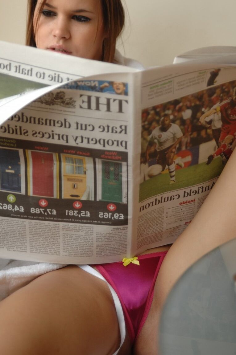 12P Chubby chick covers up her knockers before reading the morning paper