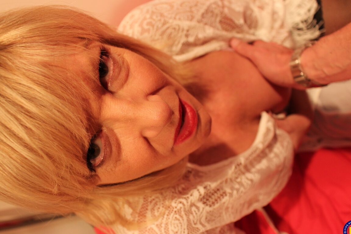 16P Old blonde lady ends up with cum on her face during POV action