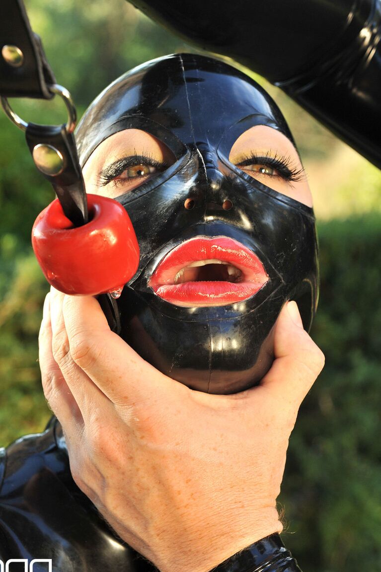 21P Huge boobed slave Latex Lucy gets face fucked while tied up outdoors