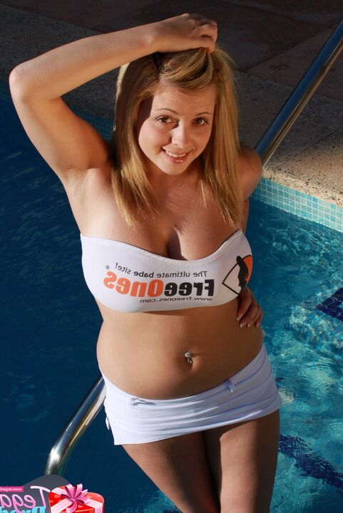 16P 18 year old blonde Tegan Brady models non nude in a tube top and tight shorts