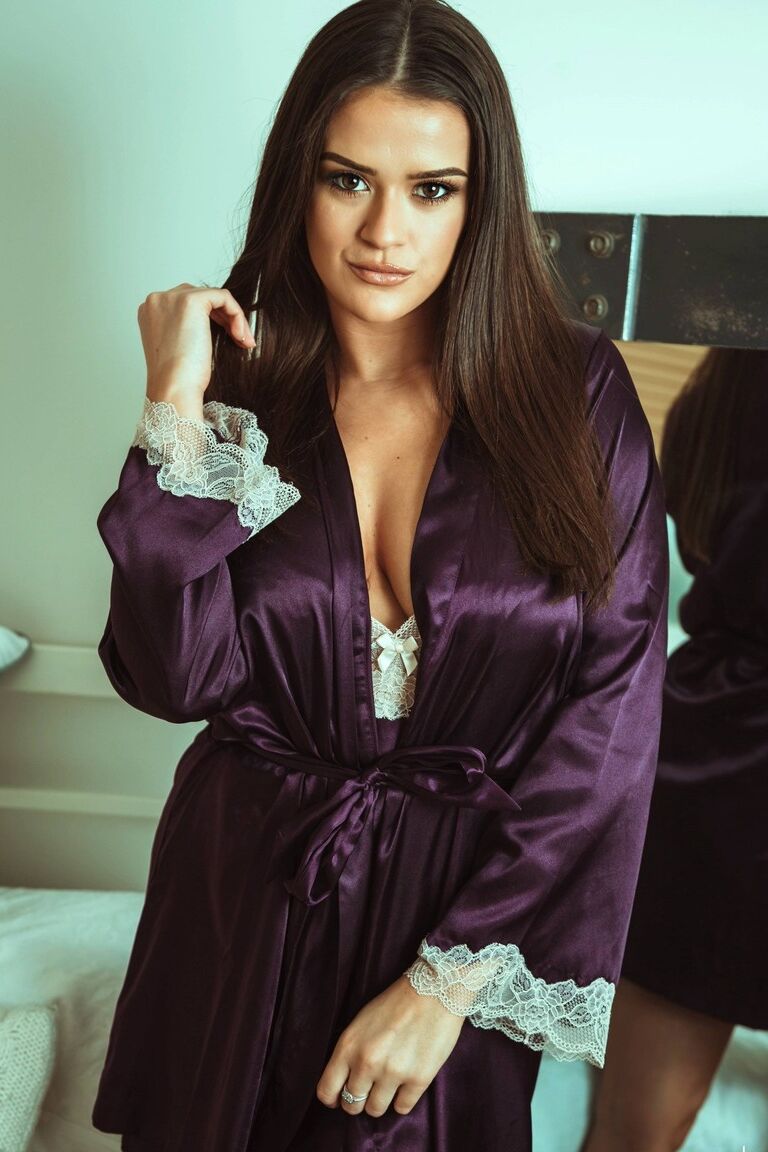 12P British beauty Brook Wright removes a satin robe to get naked on her bed