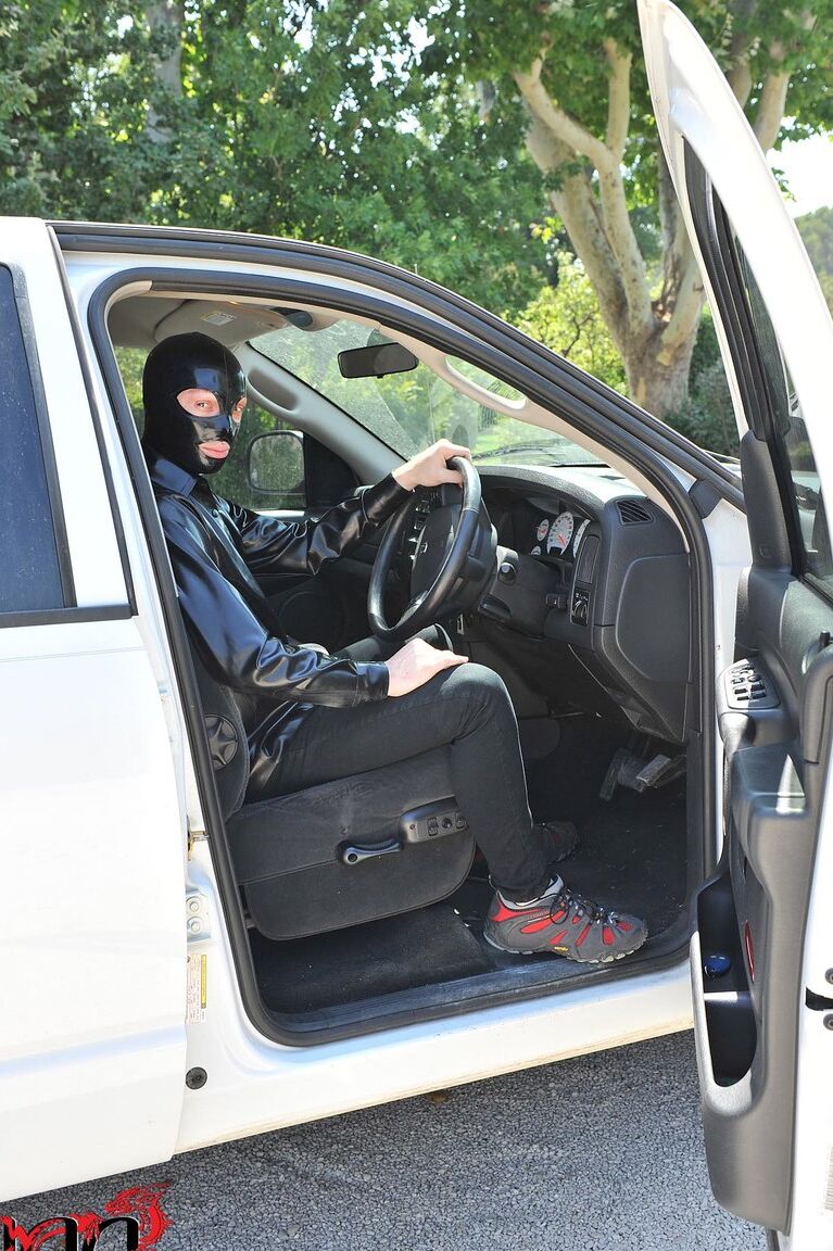21P British girl in latex Latex Lucy gets tied on a truck & water jetted in BDSM