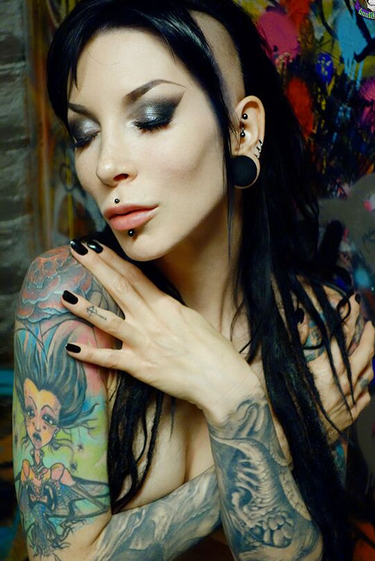 15P Goth girl Razor Candi strips to OTK boots in graffiti filled bathroom