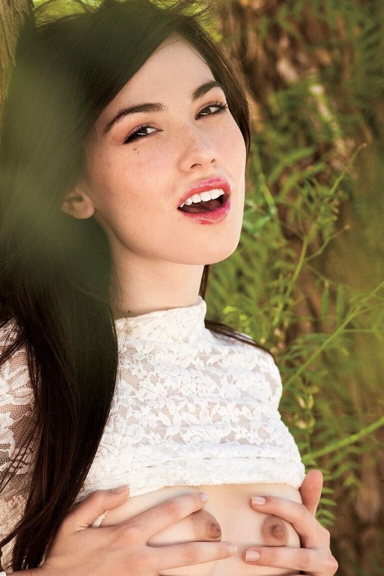 11P Dark haired teen Emily Grey frees her bald cunt from her panties under a tree