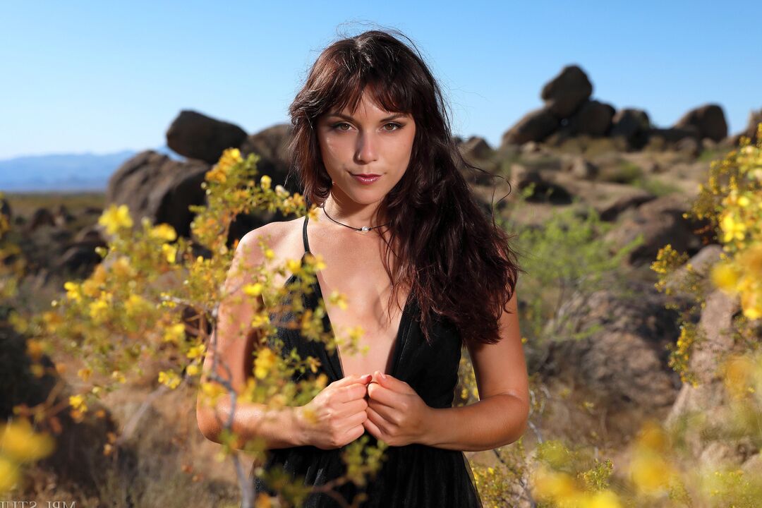 12P Pretty brunette with an ass to die for gets naked in footwear in back country