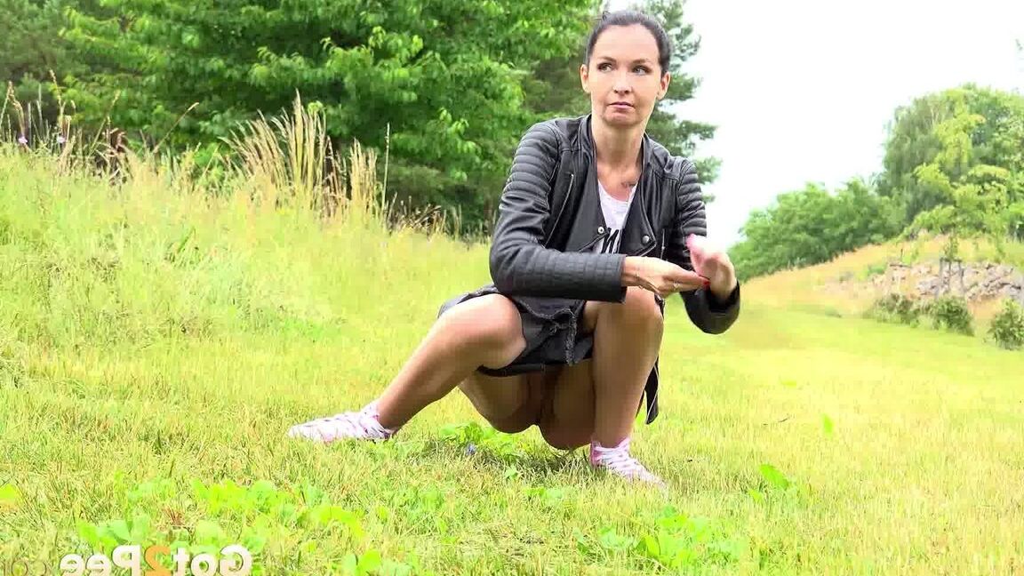15P Tall girl Mistica squats for a piss while taking a shortcut through a field