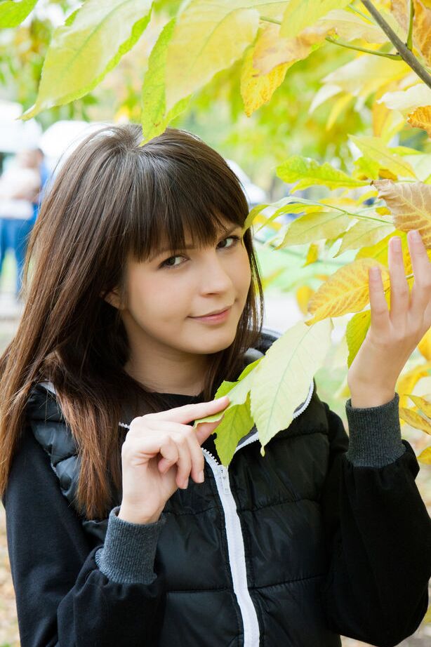 16P Adorable brunette teen comes inside on a fall day to display her shaved pussy