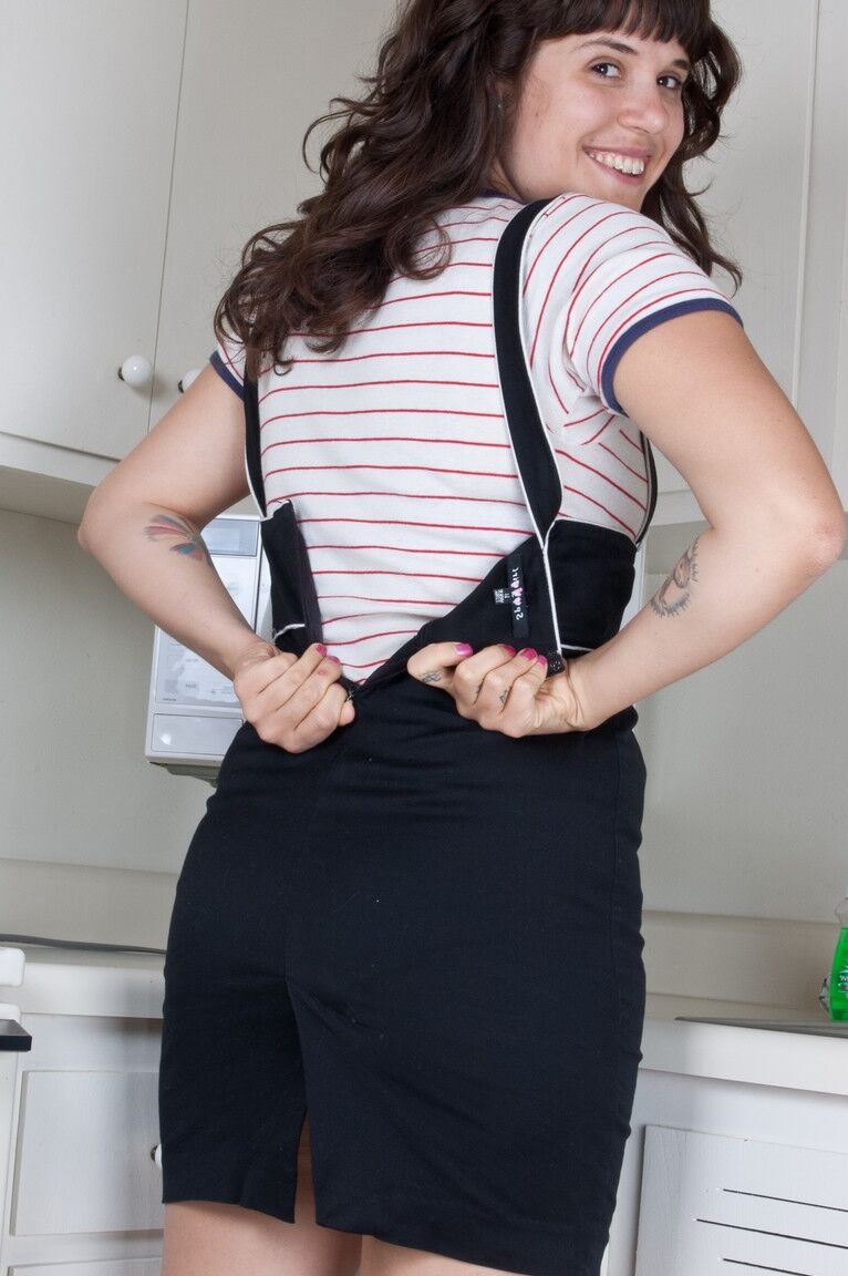 17P Babe with a big ass Penny Letters showing off her hairy cunt in the kitchen