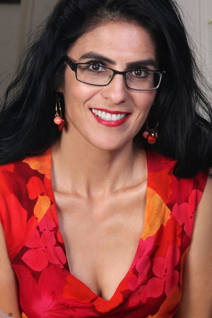 16P Dark haired amateur Theresa Soza does a striptease with her glasses on