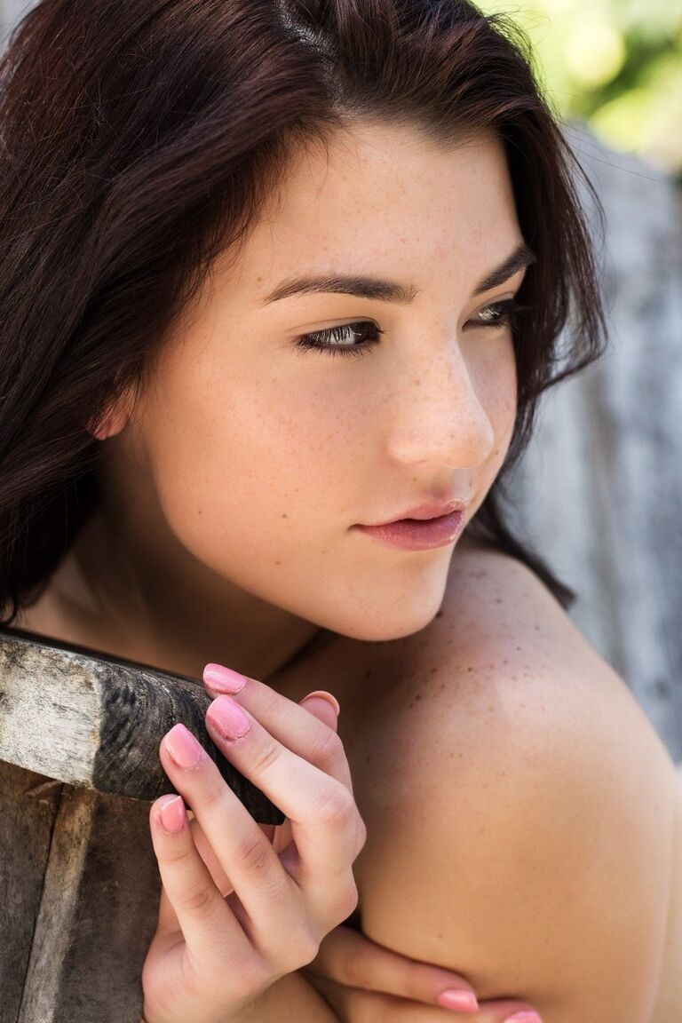 21P Beautiful teen babe Jenna Reid strips naked and poses in nature while biking