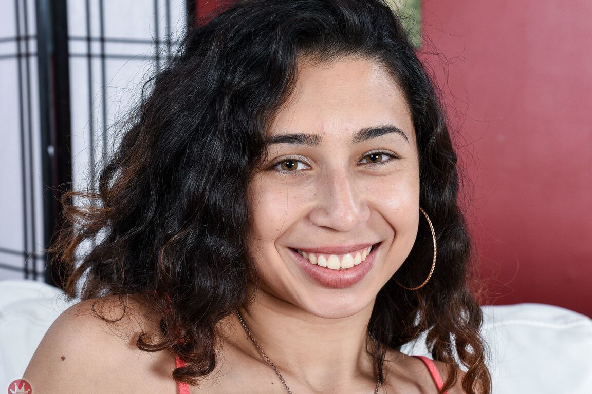 21P Curly haired babe Nataly Lopez reveals her trimmed cunt and small tits