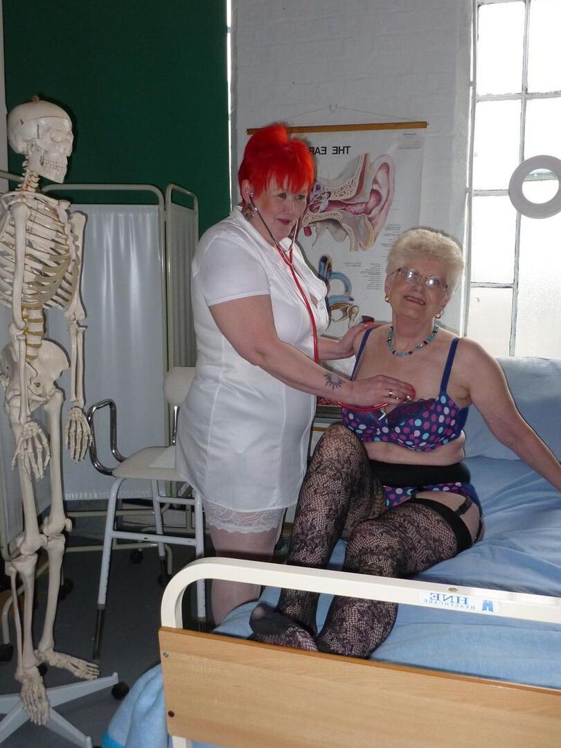 20P Redheaded nurse Valgasmic Exposed and a busty older lady play with a skeleton