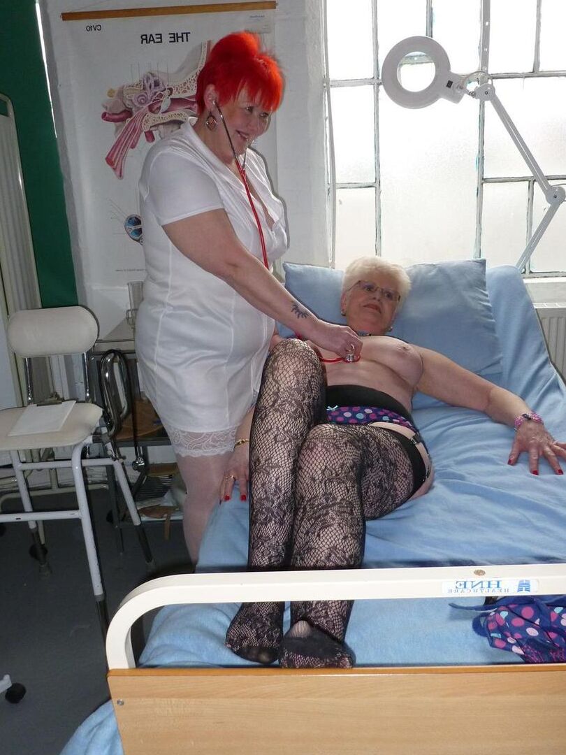 20P Redheaded nurse Valgasmic Exposed and a busty older lady play with a skeleton