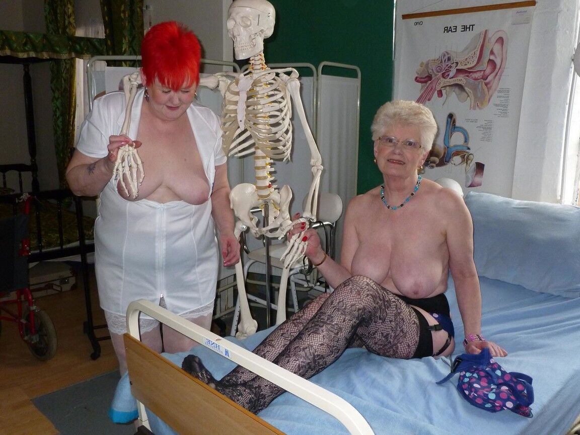 20P Redheaded nurse Valgasmic Exposed and a busty older lady play with a skeleton