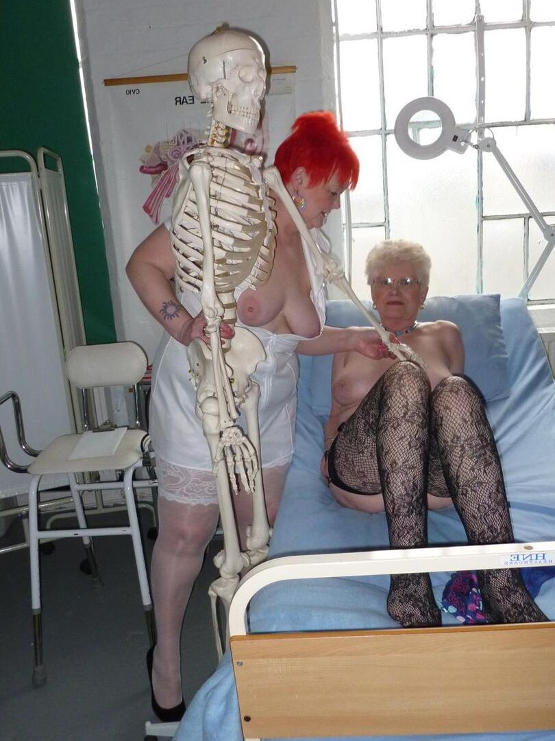 20P Redheaded nurse Valgasmic Exposed and a busty older lady play with a skeleton