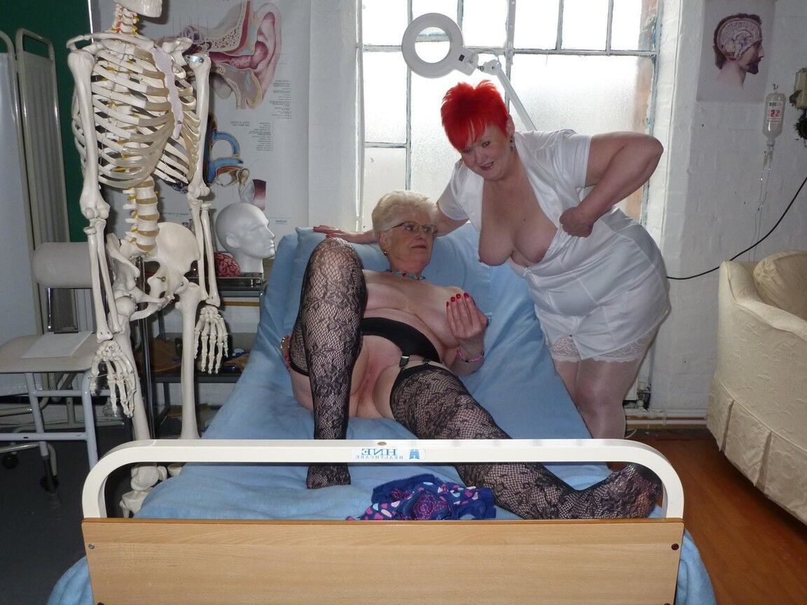 20P Redheaded nurse Valgasmic Exposed and a busty older lady play with a skeleton